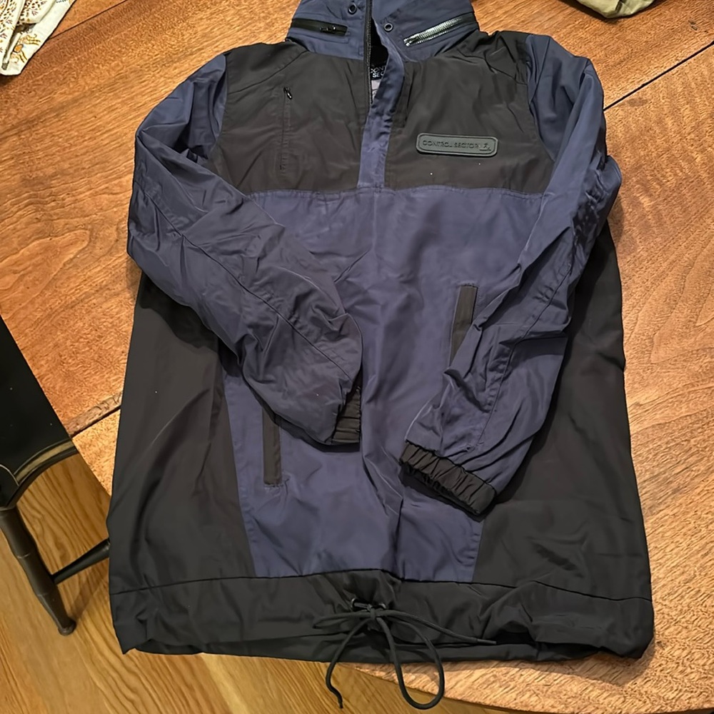 Unisex rain coat. Size XXS but fits like a women’s small